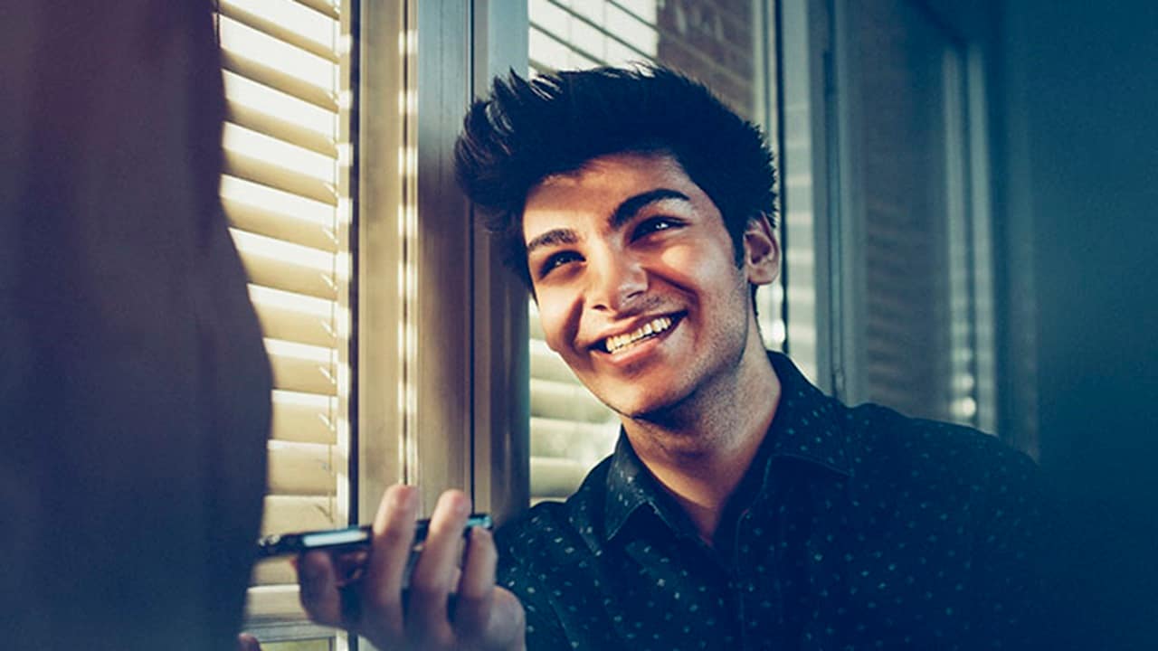 A smiling young man.