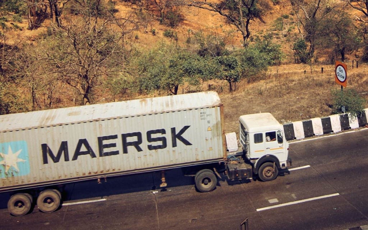 Maersk container truck driving on highway