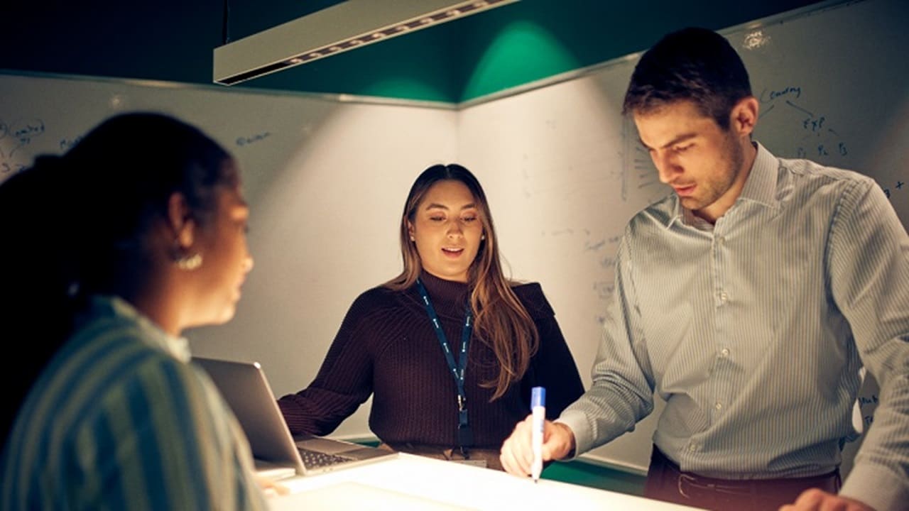 Employees working and planning on a project