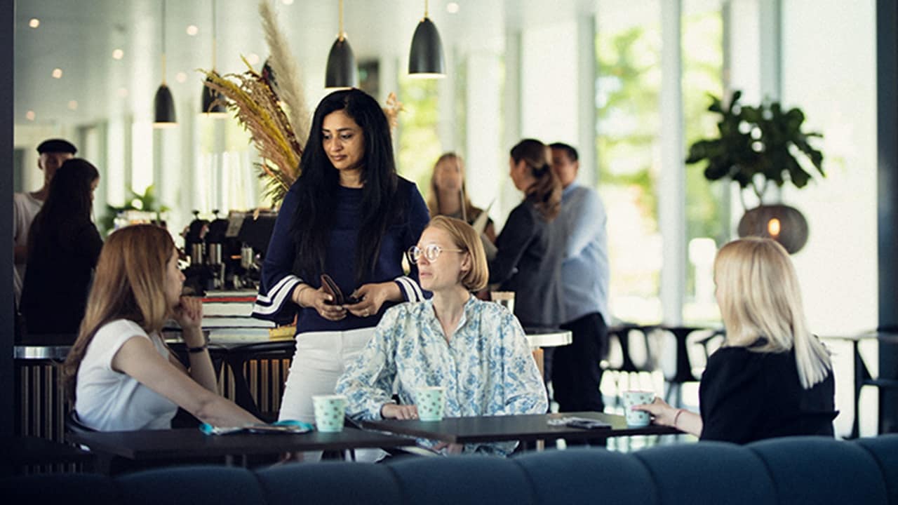 Employees having discussion at the workplace.