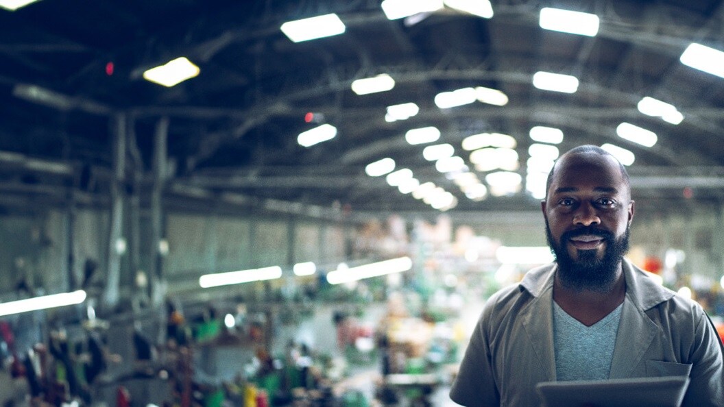 man standing in a warehousing