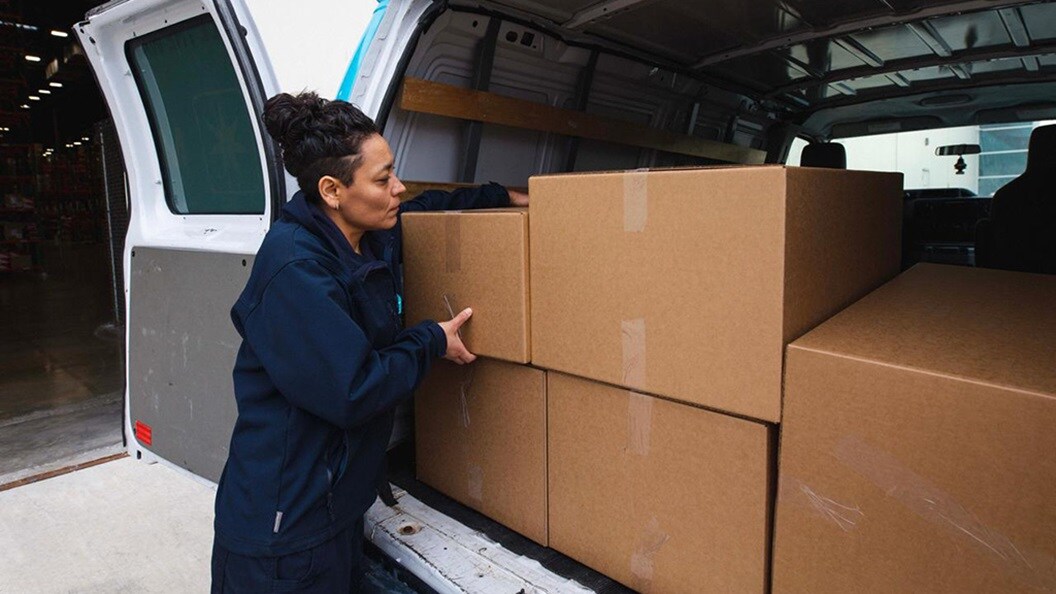 Lady loading cartonbox