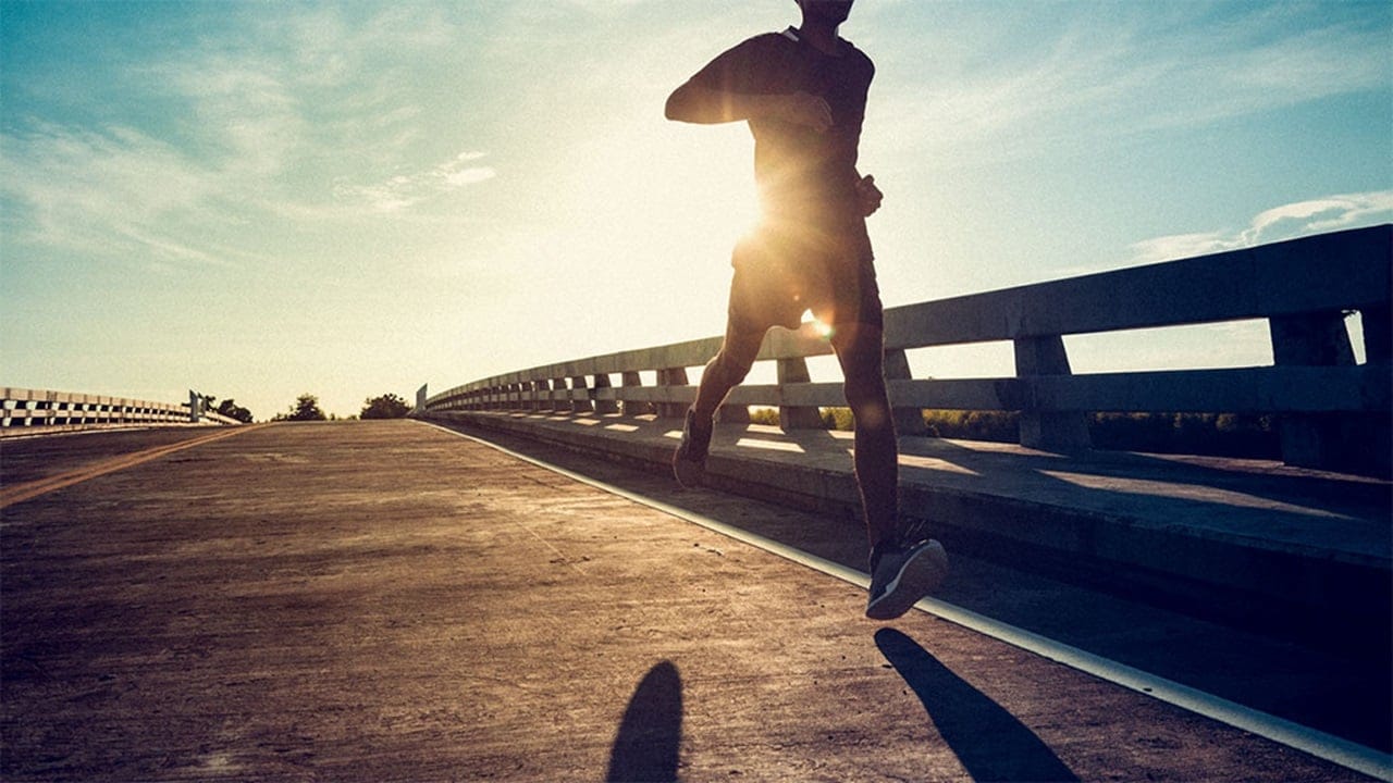 man running in sports clothing