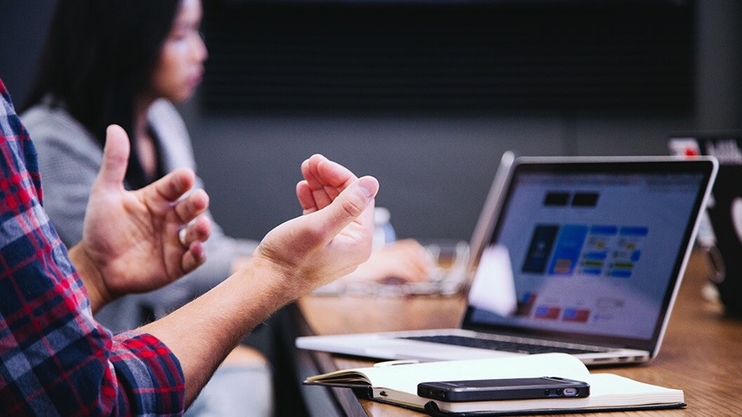 Hands of a man while searching options for returns
