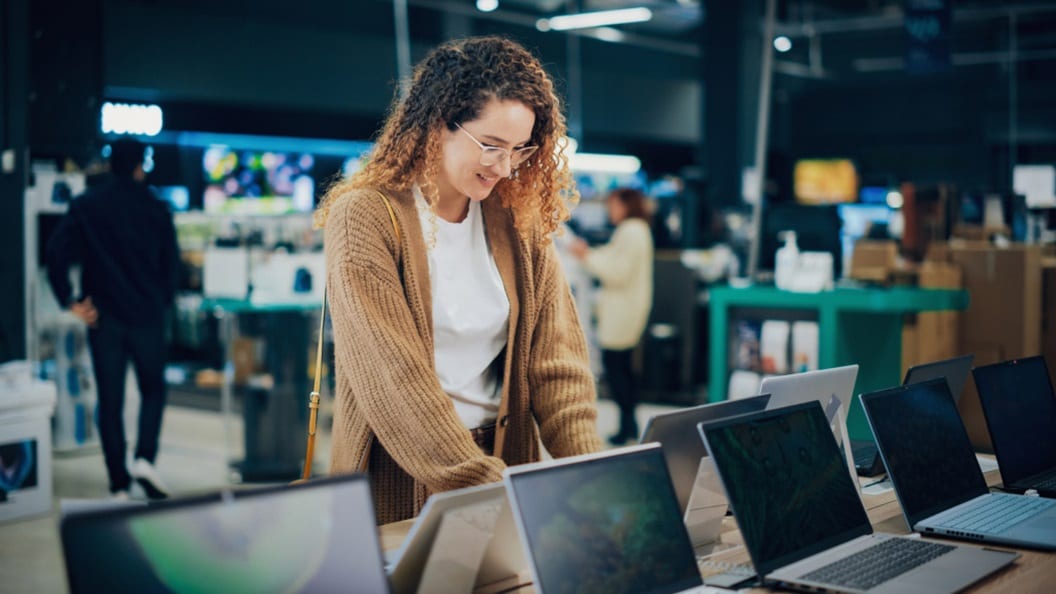 A woman in an electronics store