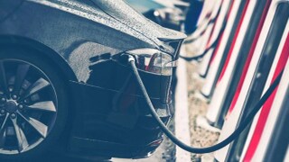 Black car charging it's battery