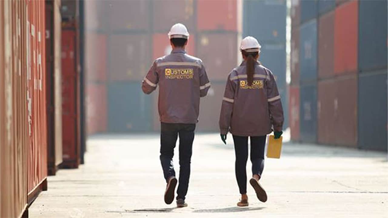 man walking in port