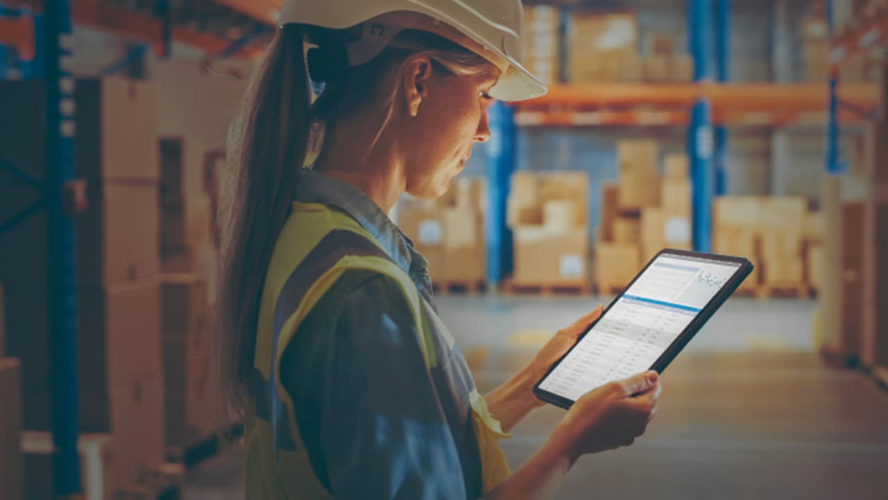 Female looking into her tablet