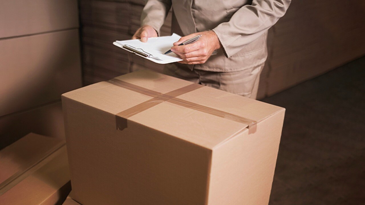 Checking the cardbox package with check list