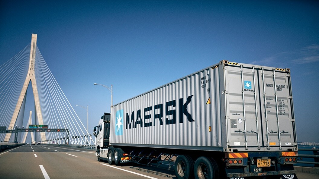 Truck with Maersk container driving in Seoul