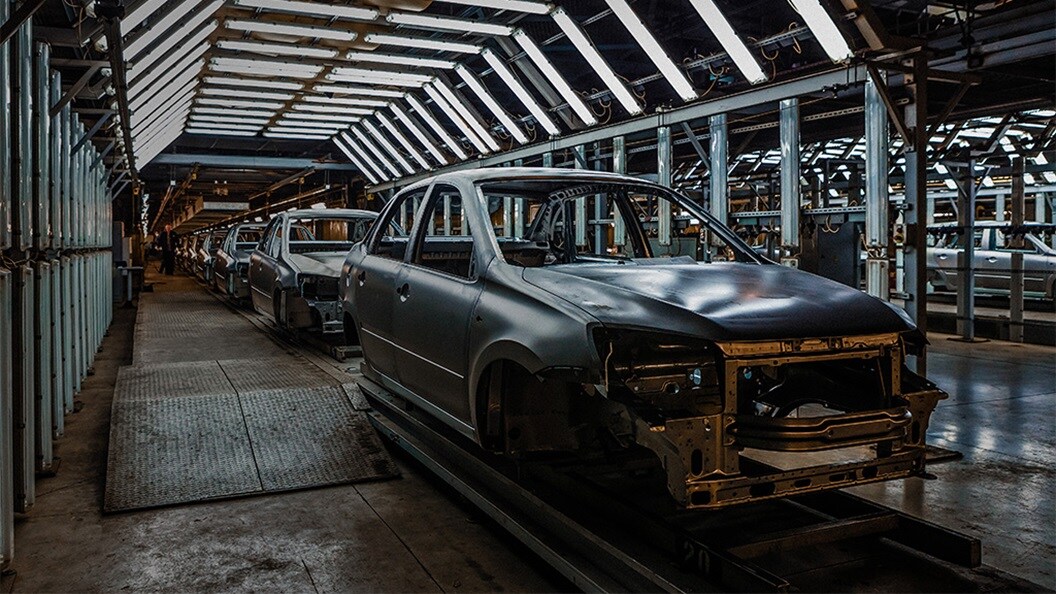 A car being built in an auto production assembly line