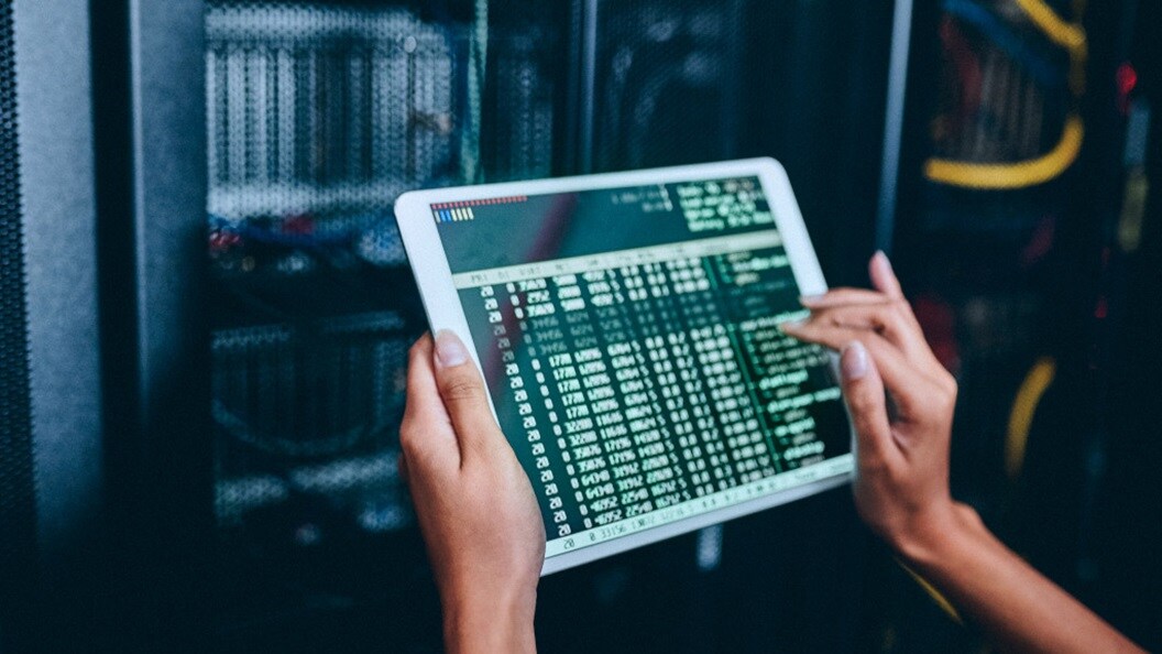 Close up shot of a set of hands using a tablet