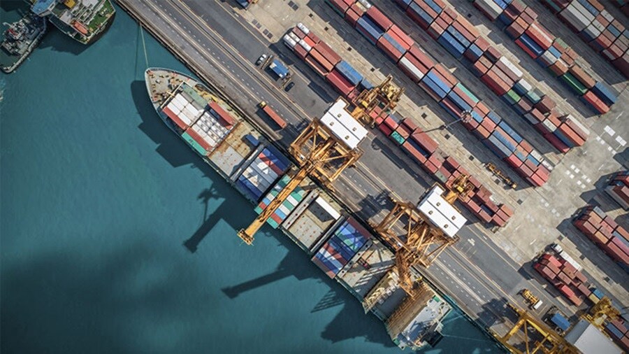 Aerial top view cargo ship terminal