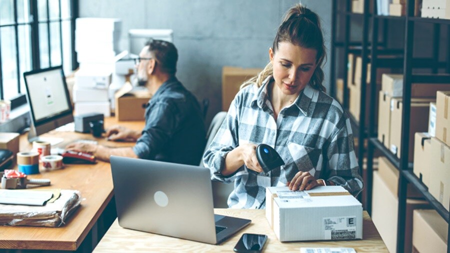 Female scanning a barcode from ashipment