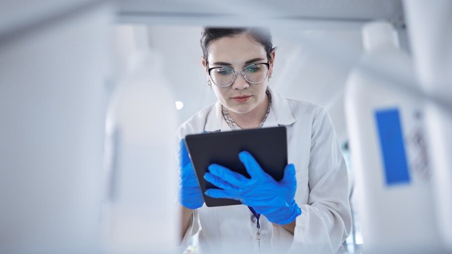 woman-medical-research-and-tablet