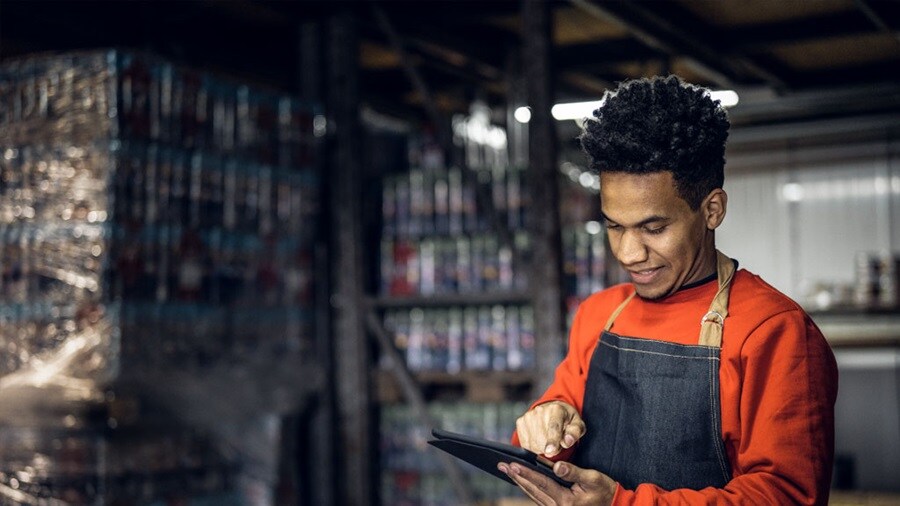 Man using tablet in warhouse