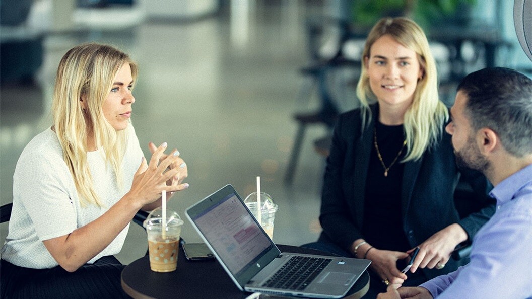 Logistics professionals discussing latest market trends in Europe.