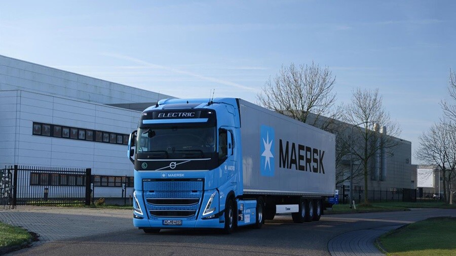 Maersk electric truck leaving warehouse