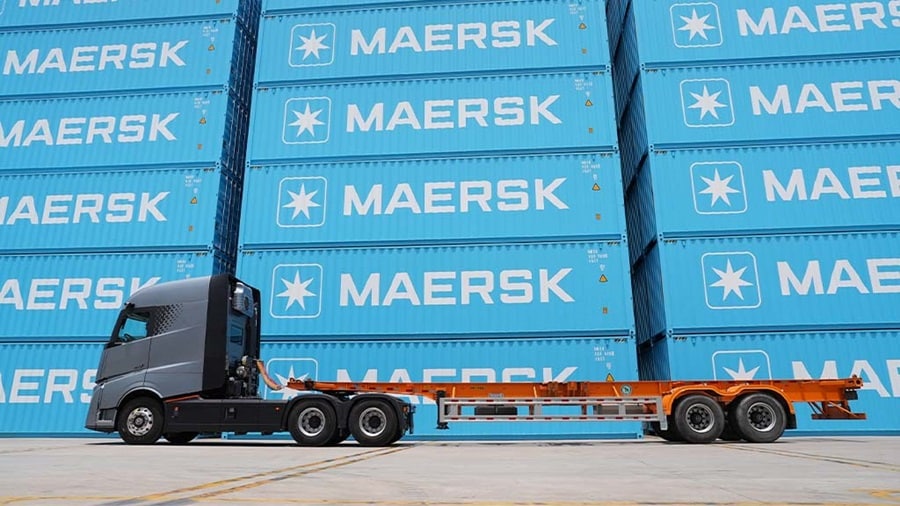 Maersk blue containers and truck at depot