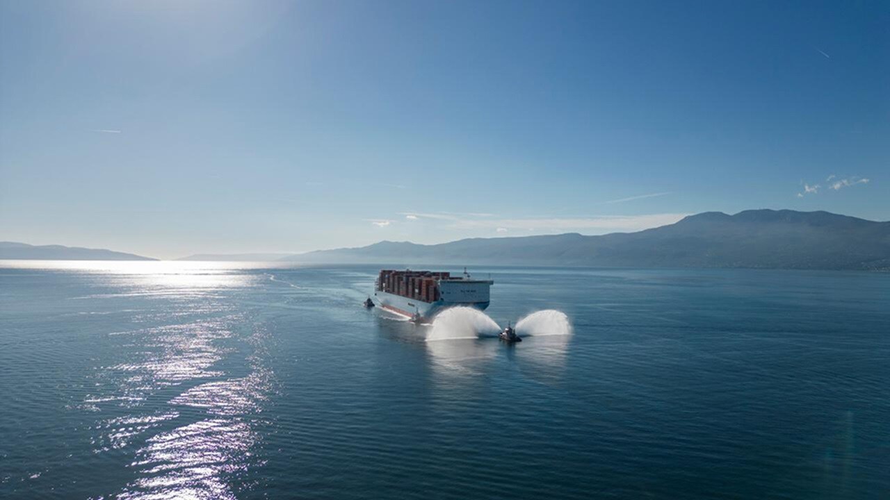 container ship sailing across calm, open water